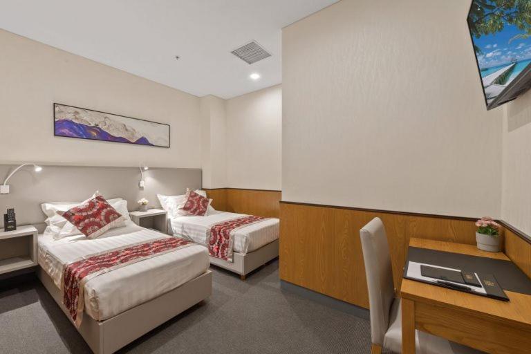 Quality Inn Hotel Кигали Экстерьер фото